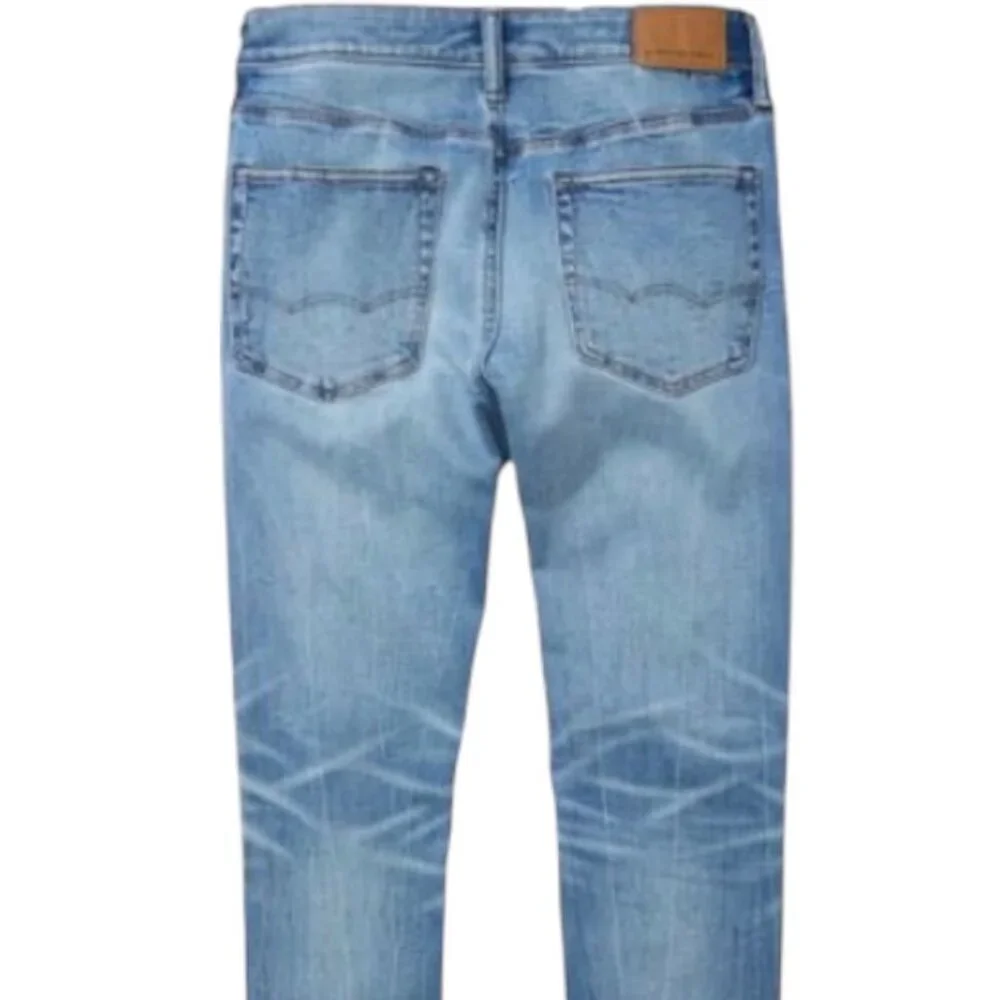 American Eagle Men's AirFlex+ Temp Tech Athletic Fit Jean  Size 34 x 32